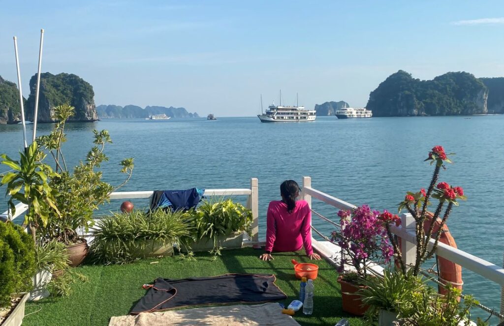 sitting on a cruise deck in Lan Ha Bay